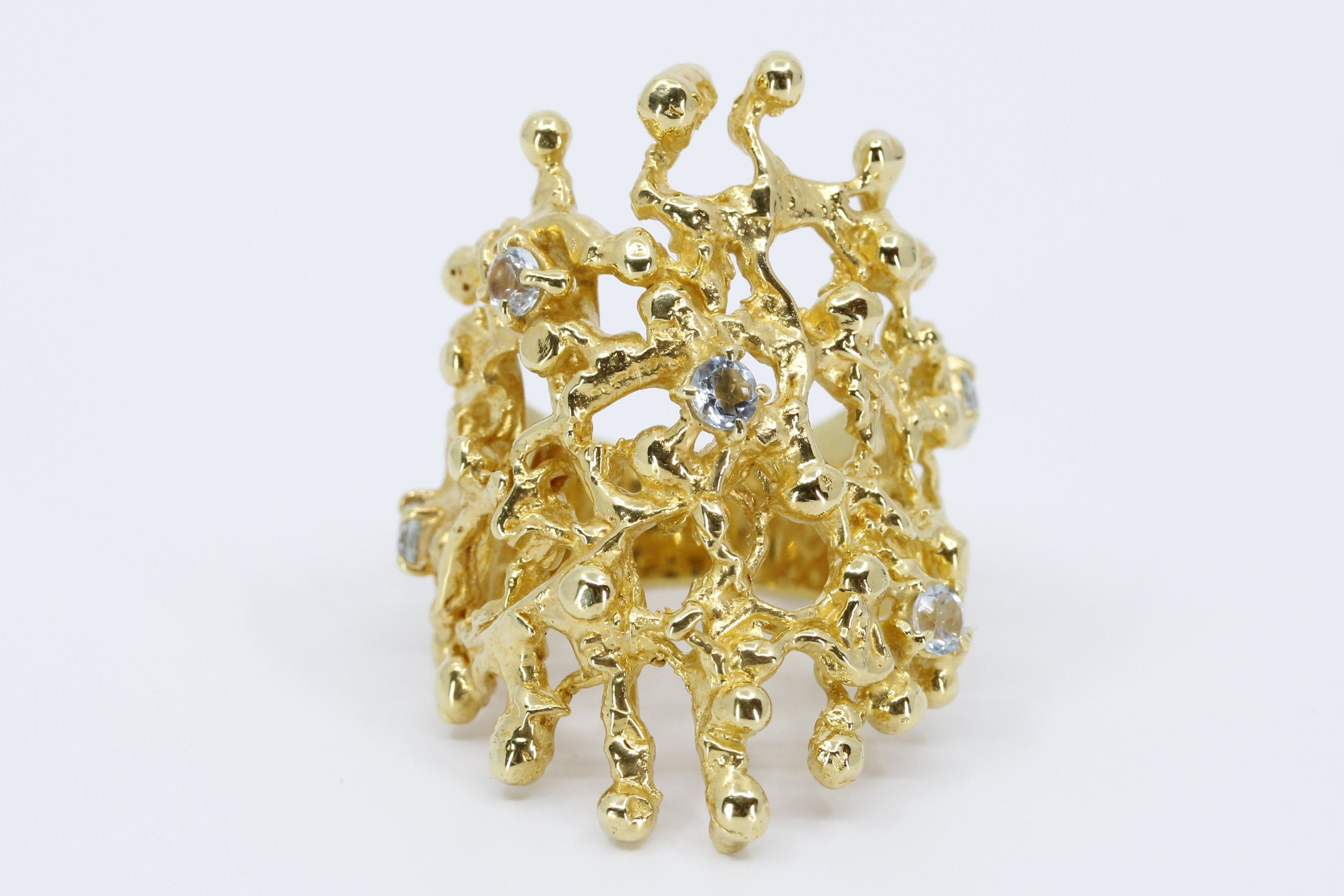 NURAI Cigar Ring with Topaz