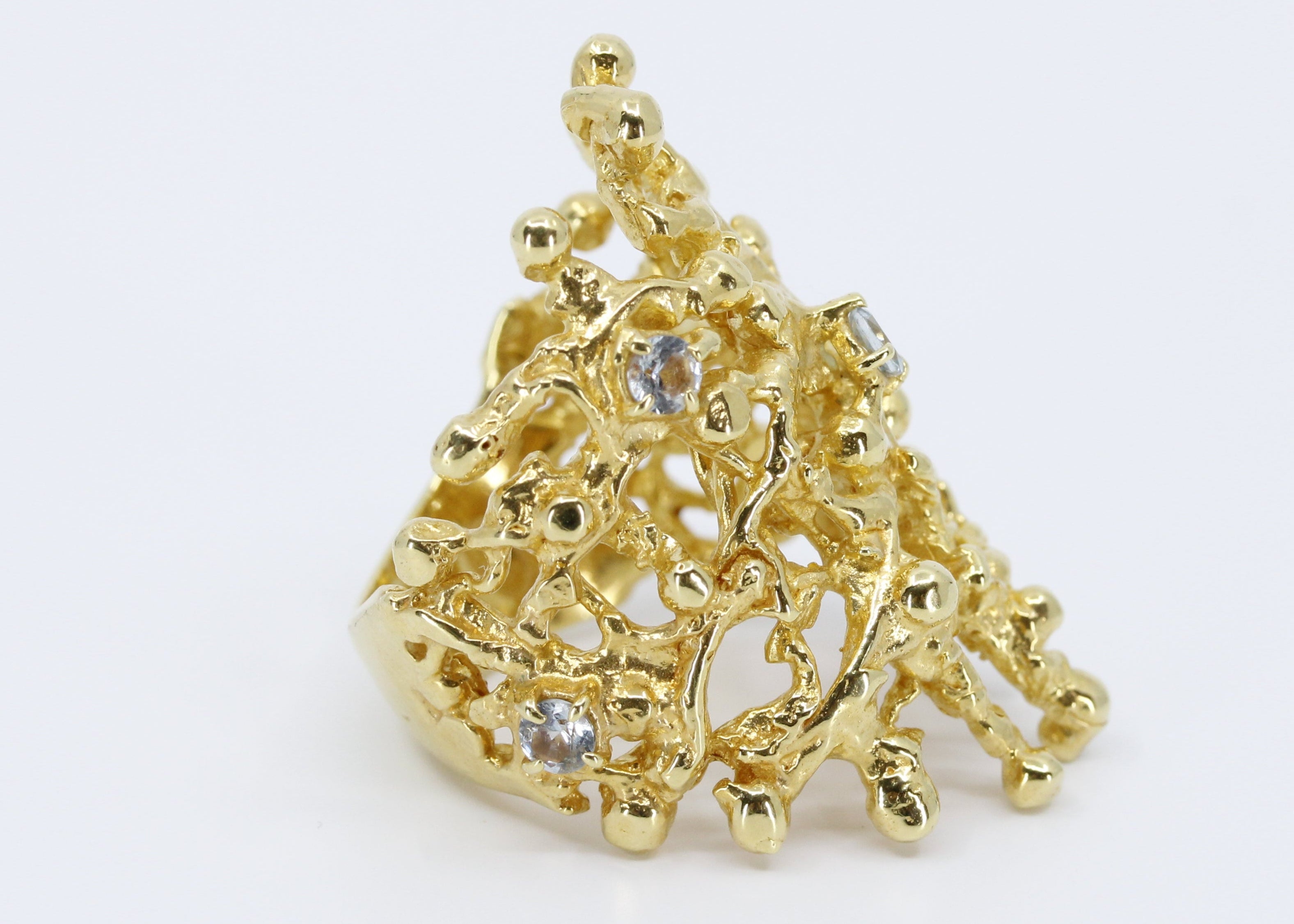 NURAI Cigar Ring with Topaz