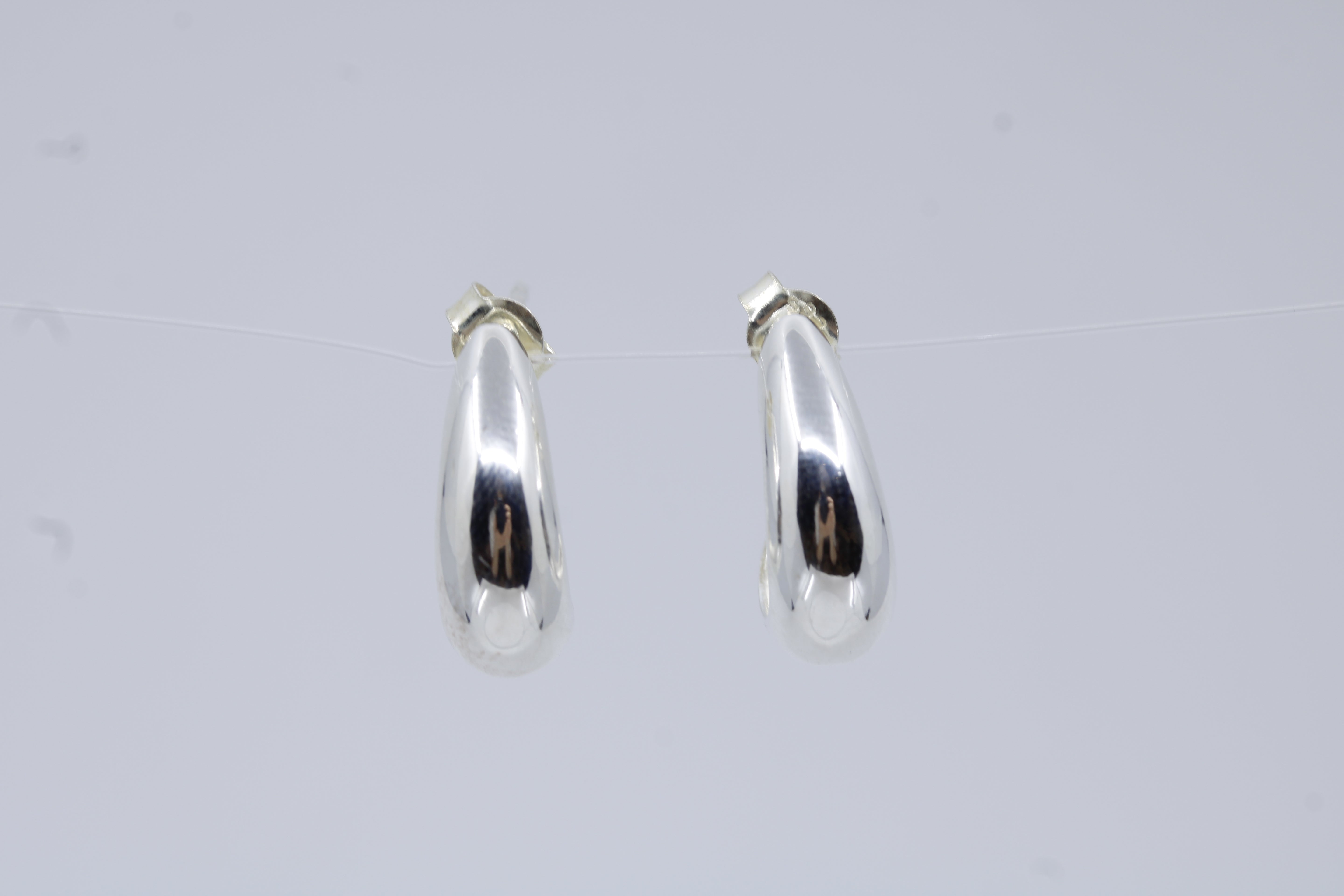 Linea Teardrop Huggie Hoop Earrings